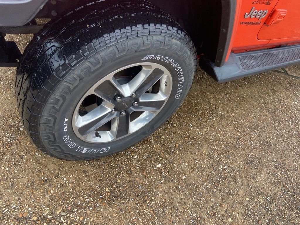 Used 2019 Orange Jeep Unlimited Sahara image 24