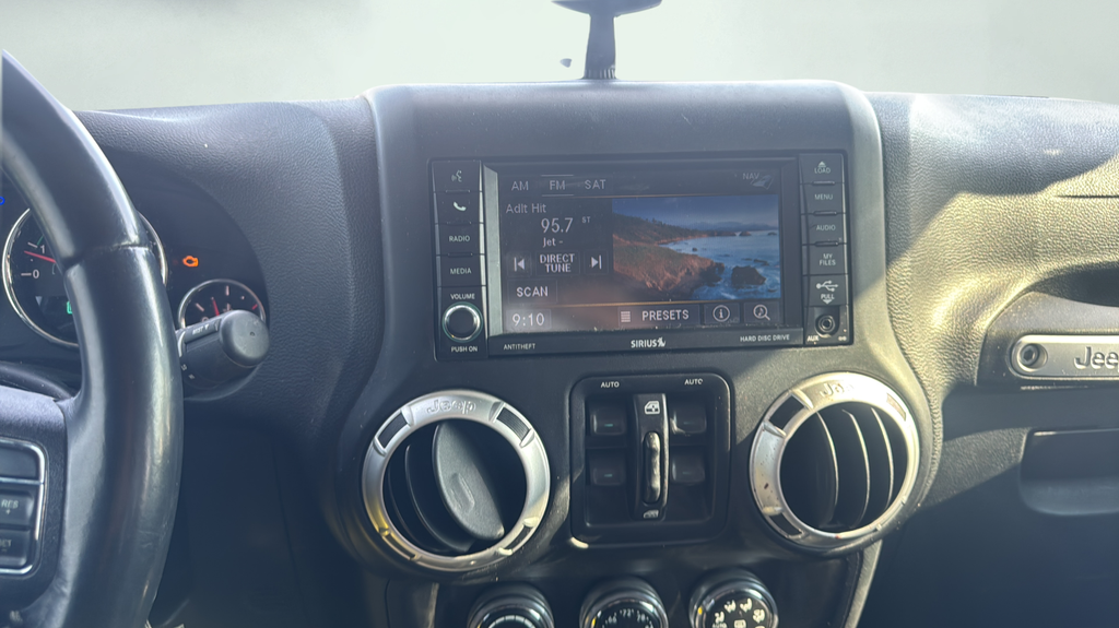 Used 2015 Black Jeep Unlimited Sahara image 16
