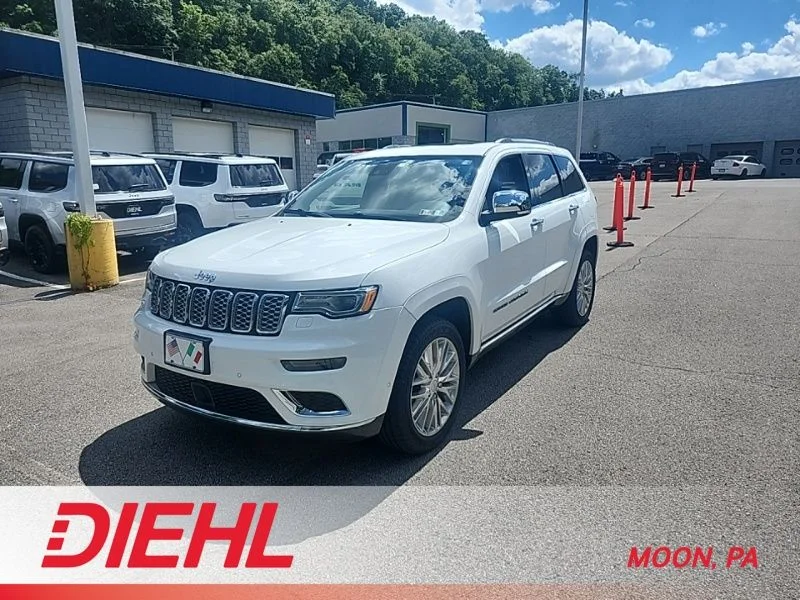 Used 2018 White Jeep Summit image 1