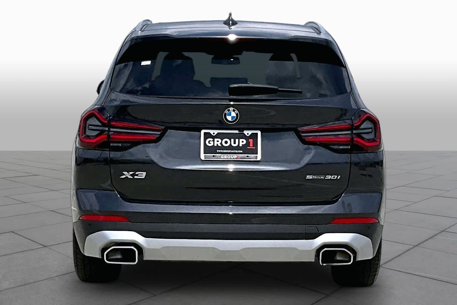 Used 2024 Dark Graphite Metallic BMW sDrive30i image 4