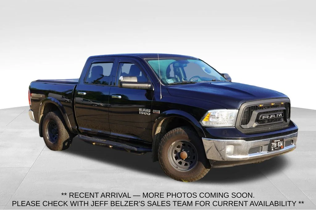 Used 2016 Brilliant Black Crystal Pearlcoat Ram Laramie image 1
