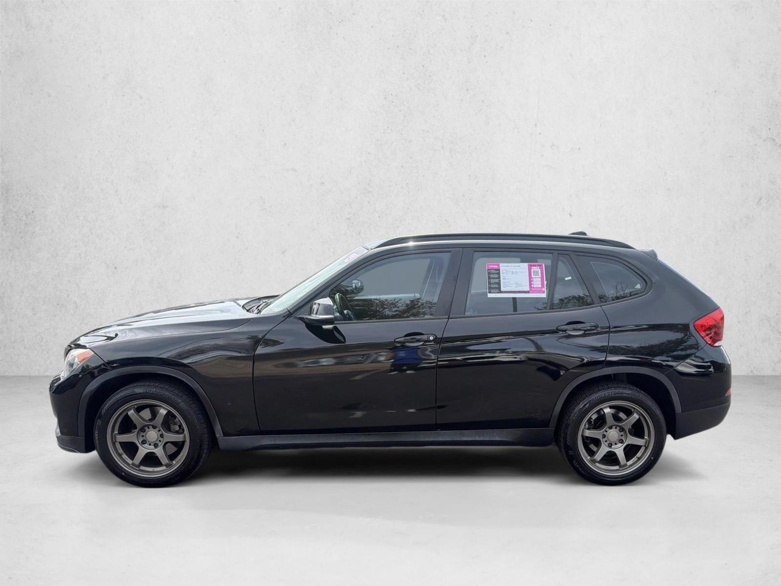 Used 2015 BMW X1 28i with VIN WBAVL1C56FVY40979 for sale in Centennial, CO