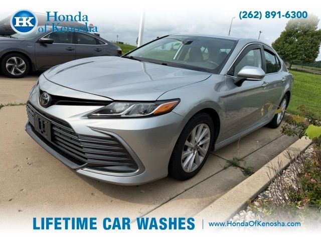 Used 2022 Celestial Silver Metallic Toyota LE image 1