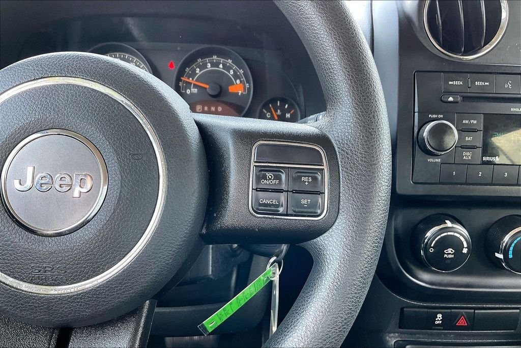 Used 2016 Maximum Steel Metallic Jeep Sport image 11