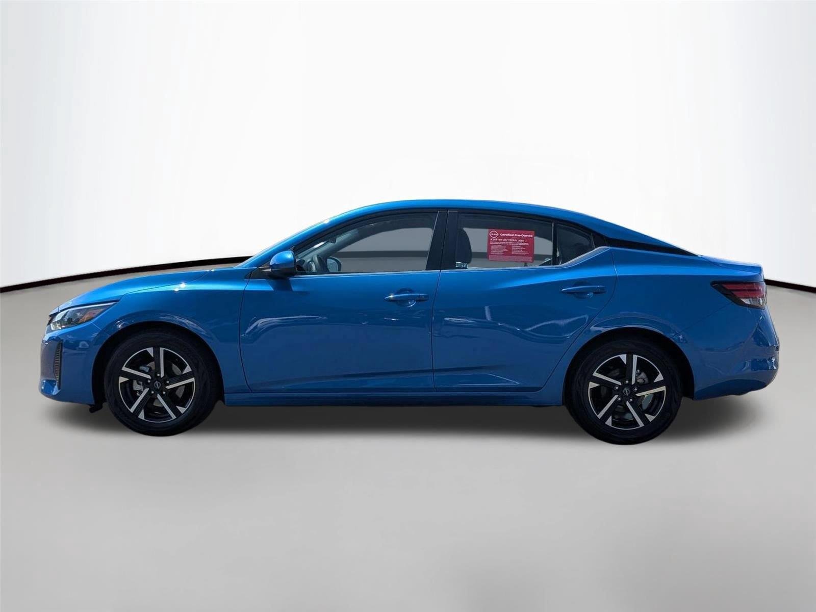 Used 2025 Electric Blue Metallic Nissan SV image 2