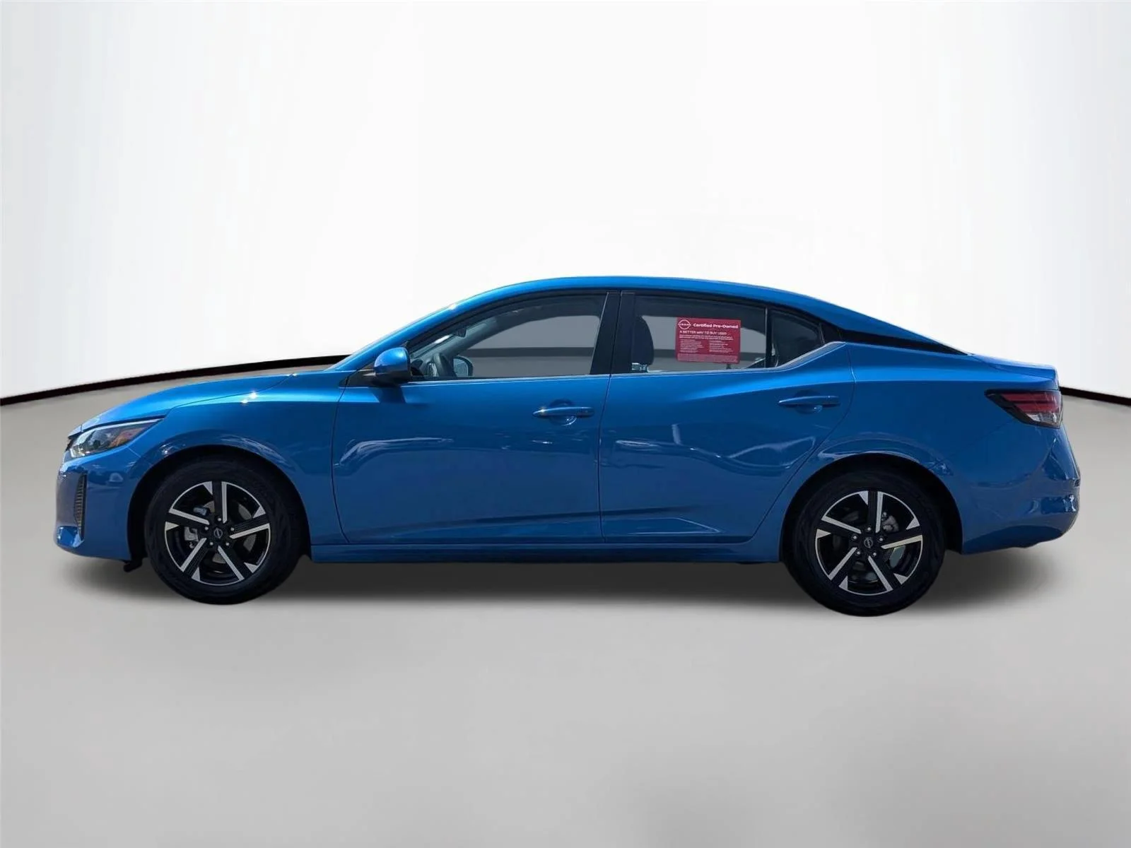 Used 2025 Electric Blue Metallic Nissan SV image 2