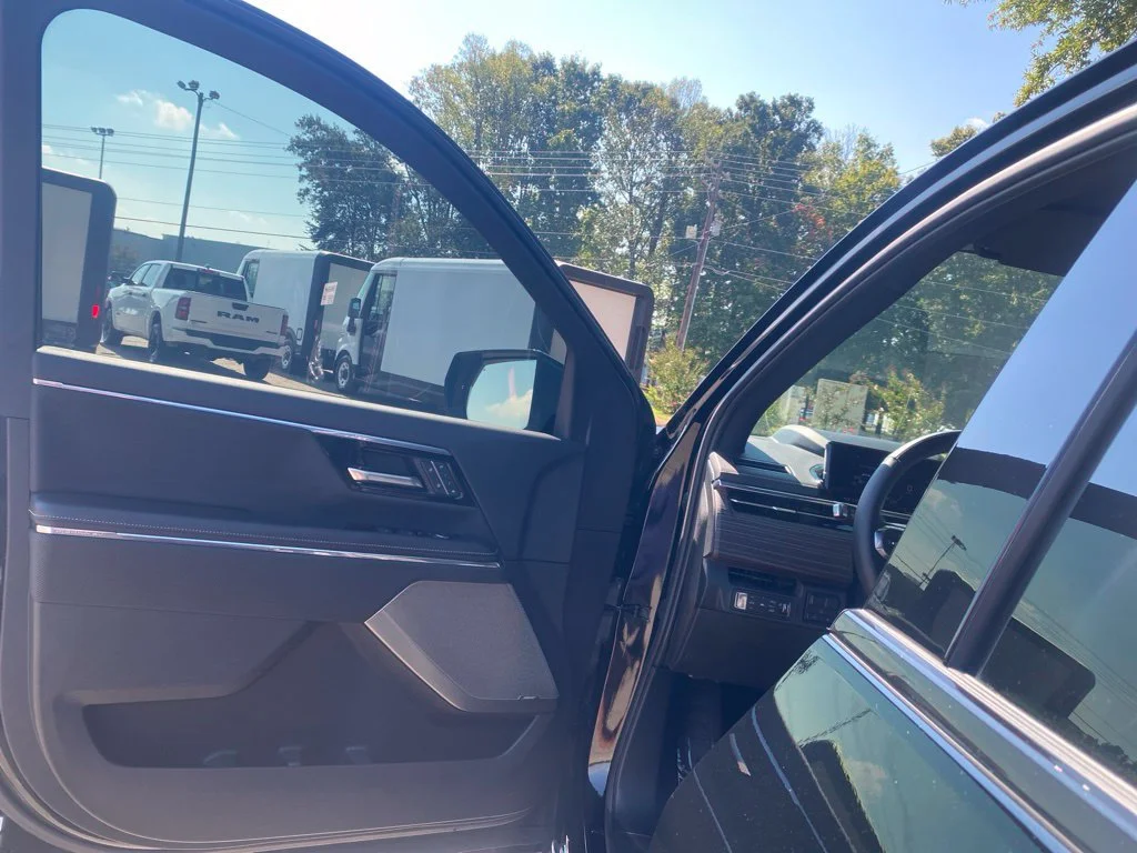 Used 2025 Onyx Black GMC Max Range Denali image 17