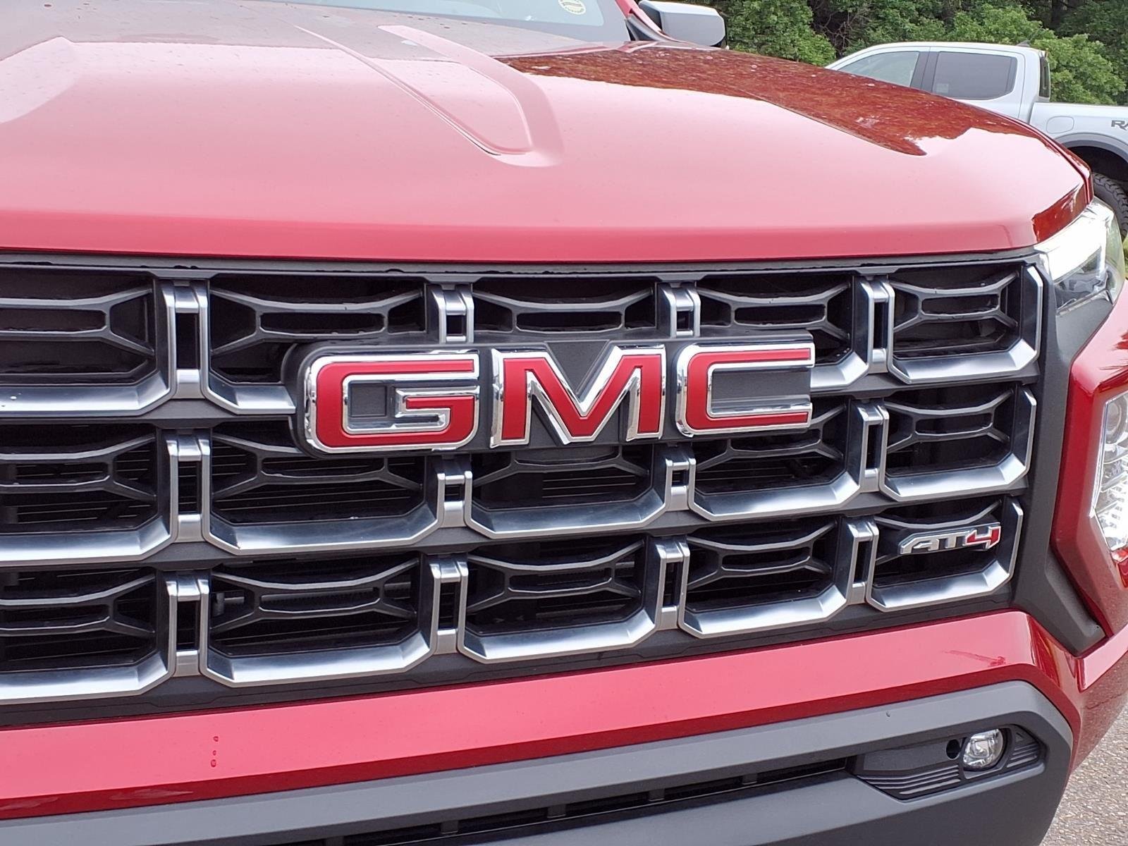 Used 2025 Volcanic Red Tintcoat GMC 4WD AT4 image 14