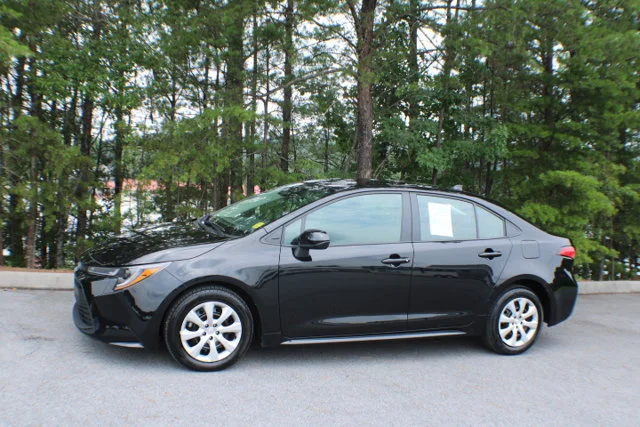 Used 2025 Midnight Black Metallic Toyota LE image 4