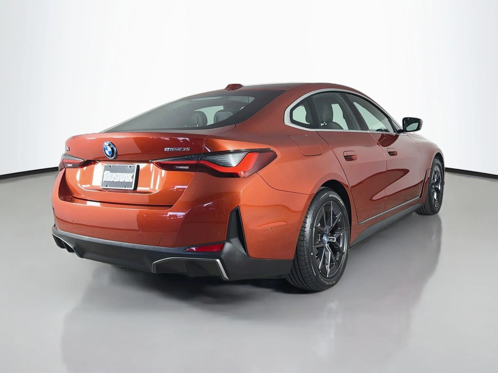 Certified Used 2024 Sunset Orange Metallic BMW eDrive35 image 7