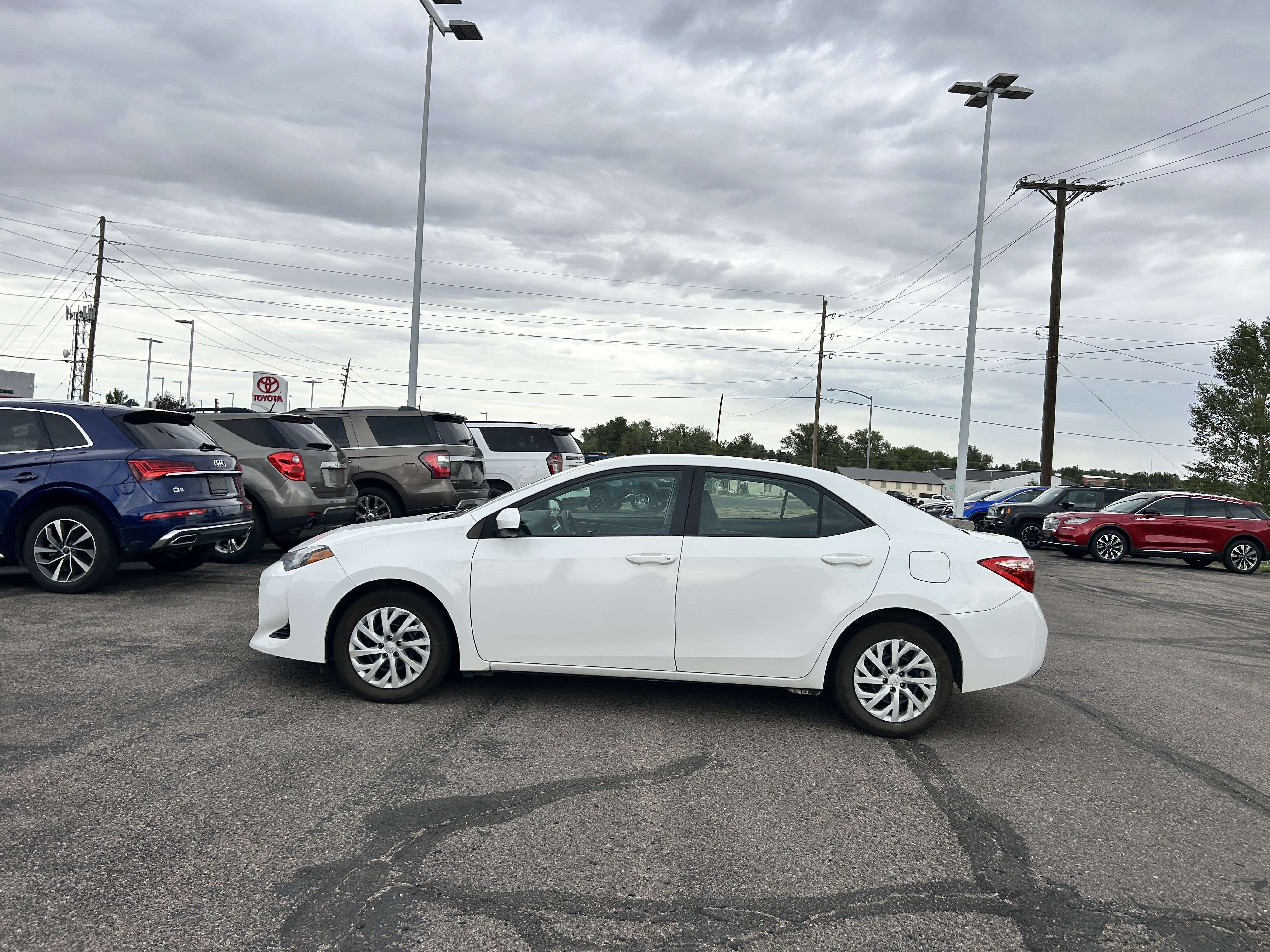 Used 2019 Toyota Corolla LE with VIN 5YFBURHE0KP918499 for sale in Cheyenne, WY