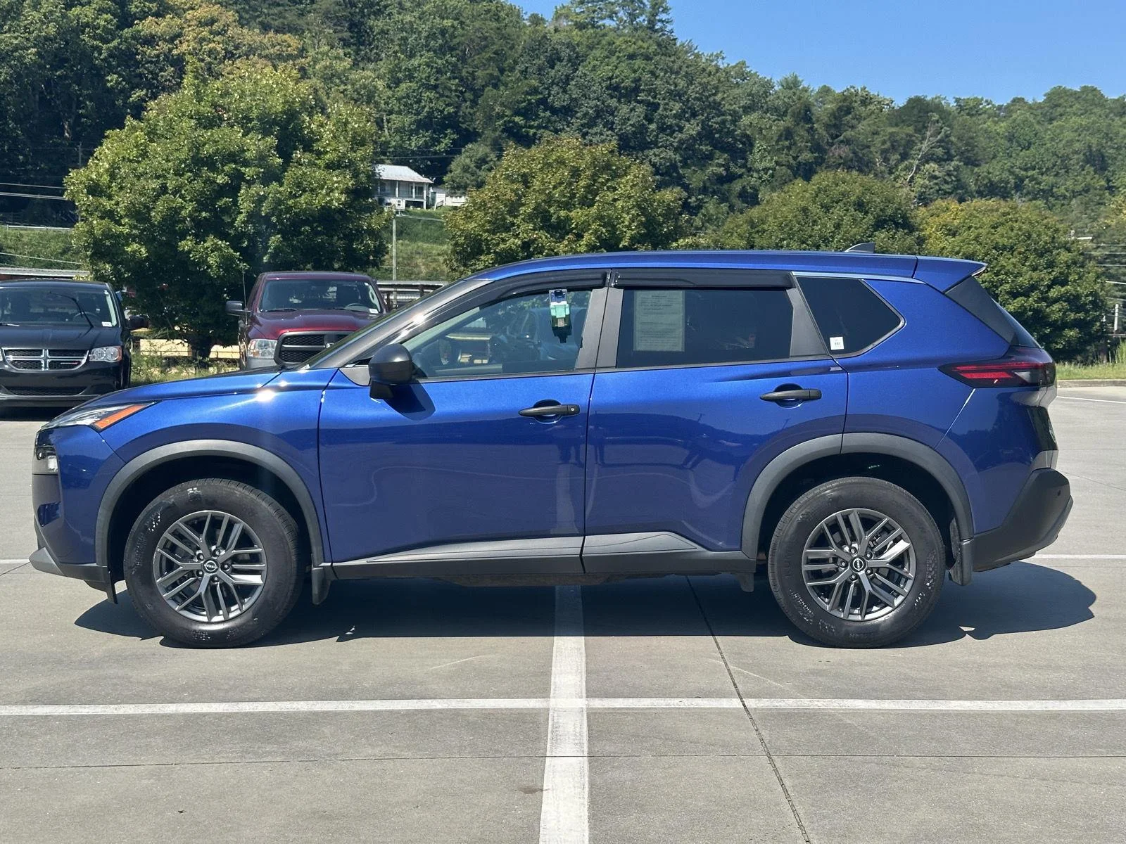 Used 2023 Caspian Blue Metallic Nissan S image 4