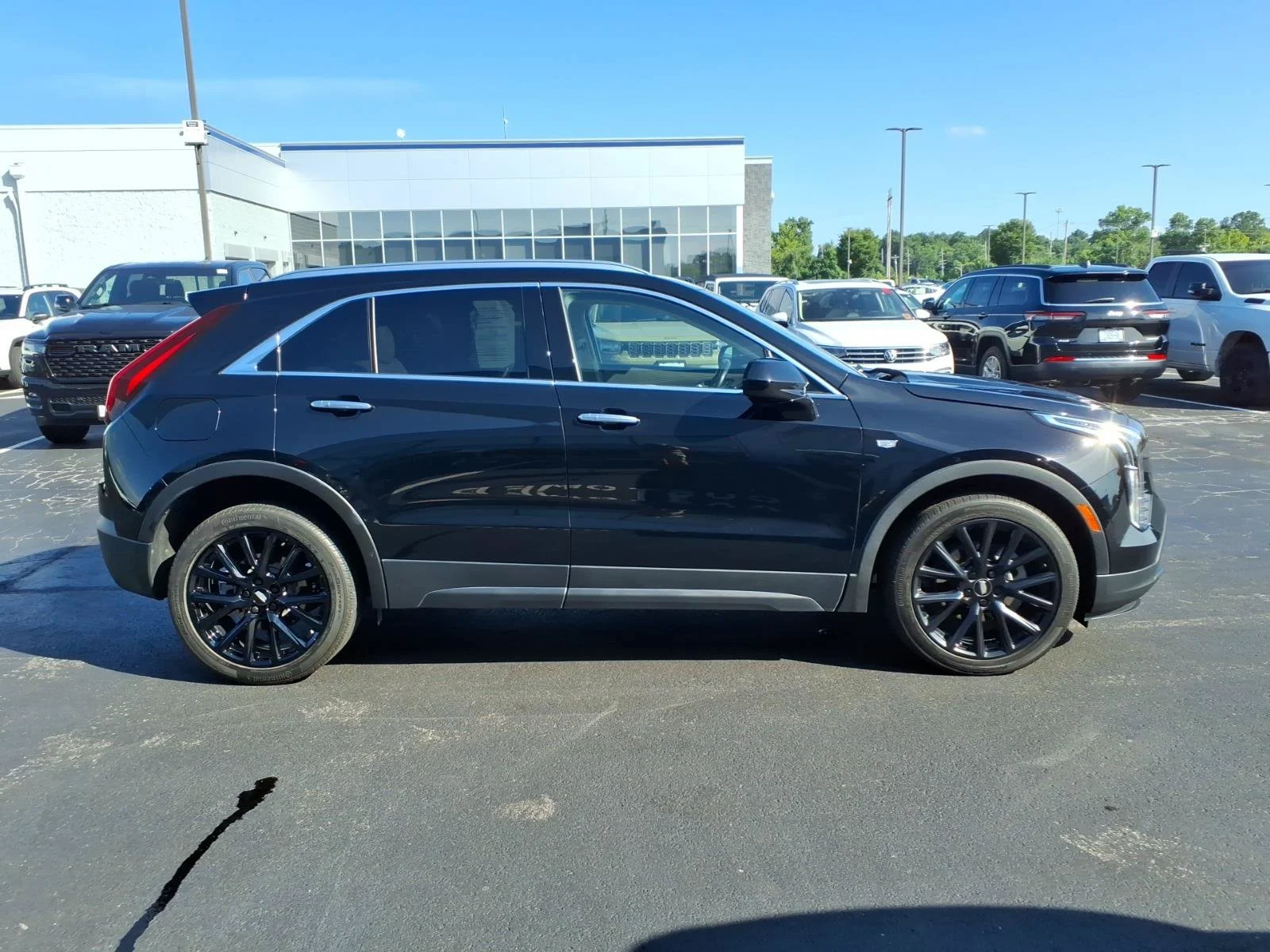 Used 2023 Stellar Black Metallic Cadillac AWD Luxury image 29