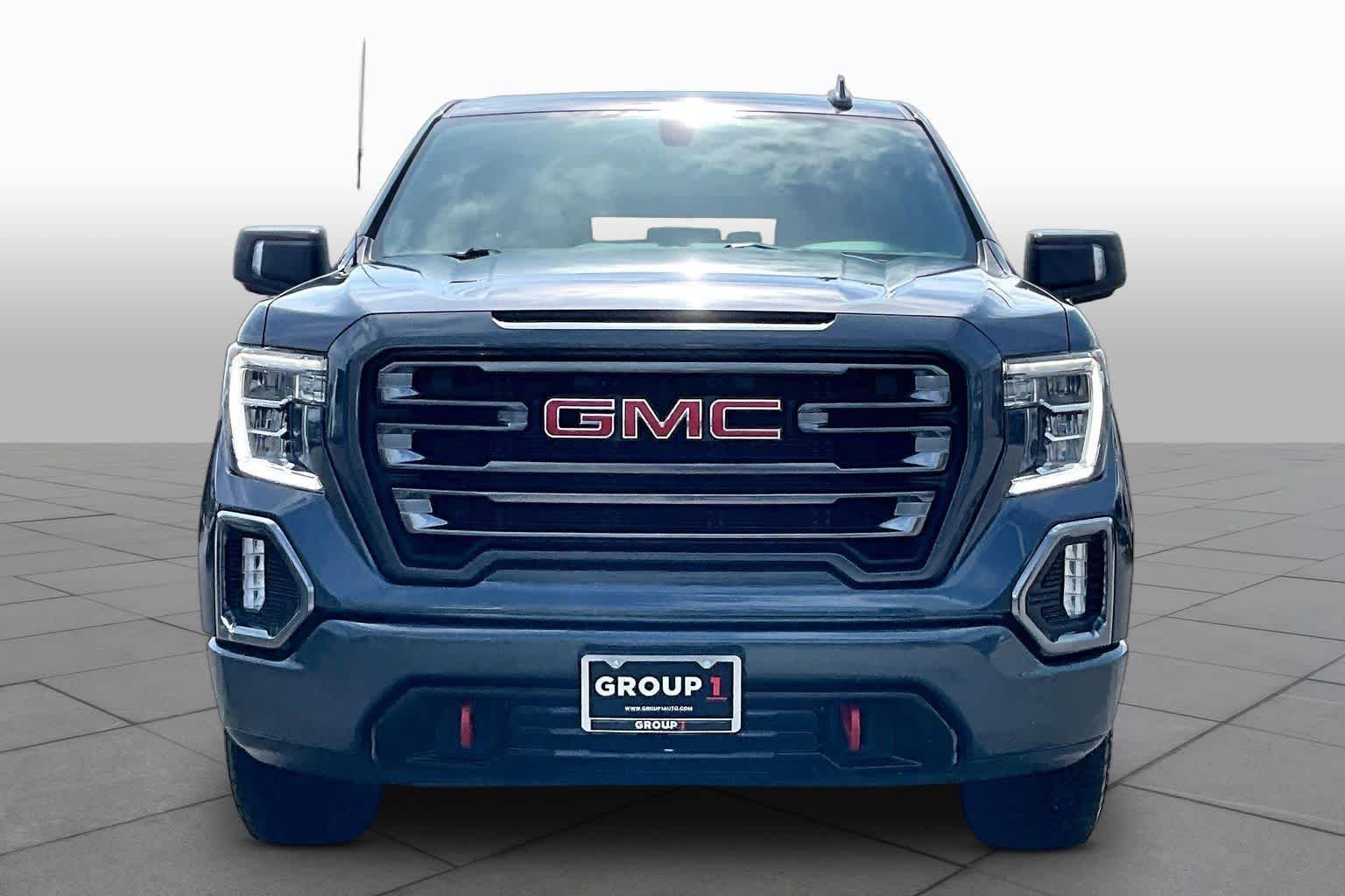 Used 2021 DARK SKY METALLIC GMC AT4 image 4