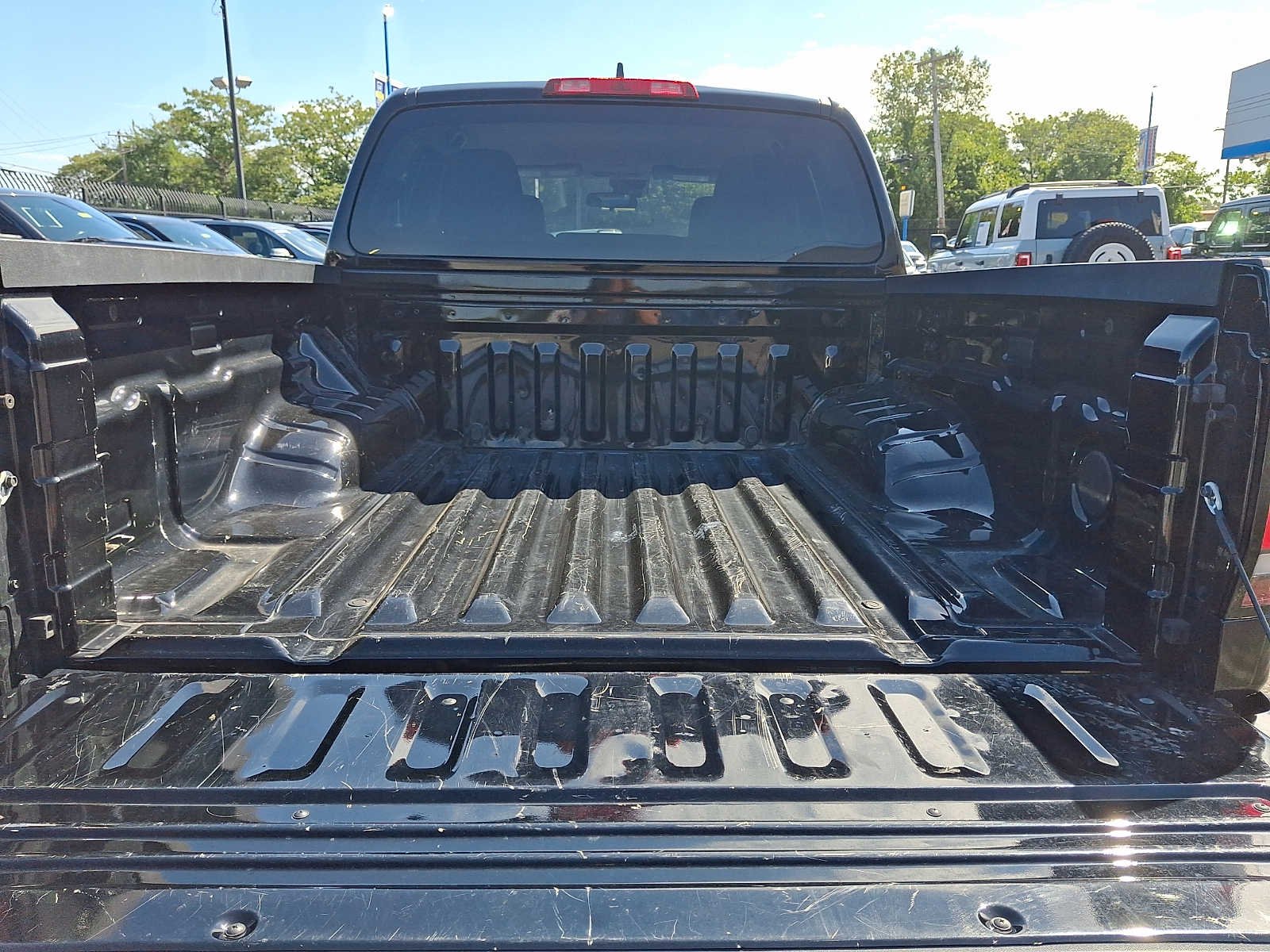 Used 2024 Black Nissan Crew Cab SV 4x4 image 28