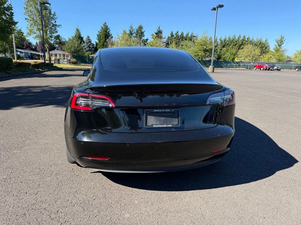Used 2021 Solid Black Tesla Standard Range Plus image 6
