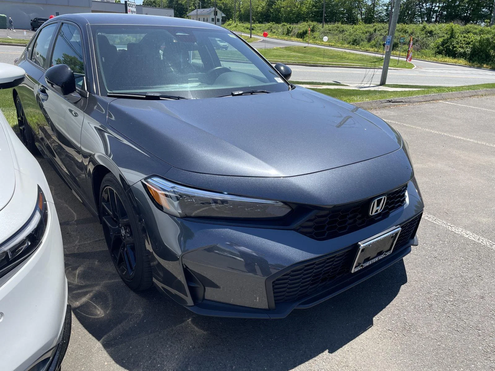 2025 Honda Civic Sport CVT's photo