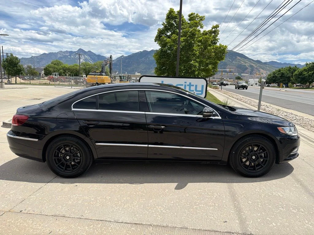 Used 2017 Black Volkswagen 2.0T Sport image 2