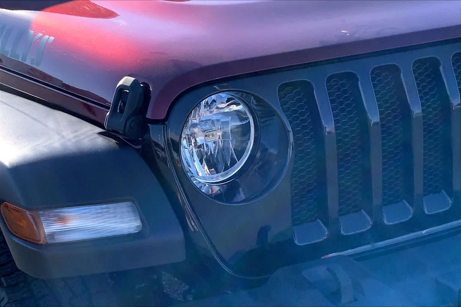 Used 2021 Snazzberry Pearlcoat Jeep Unlimited Willys Sport image 28