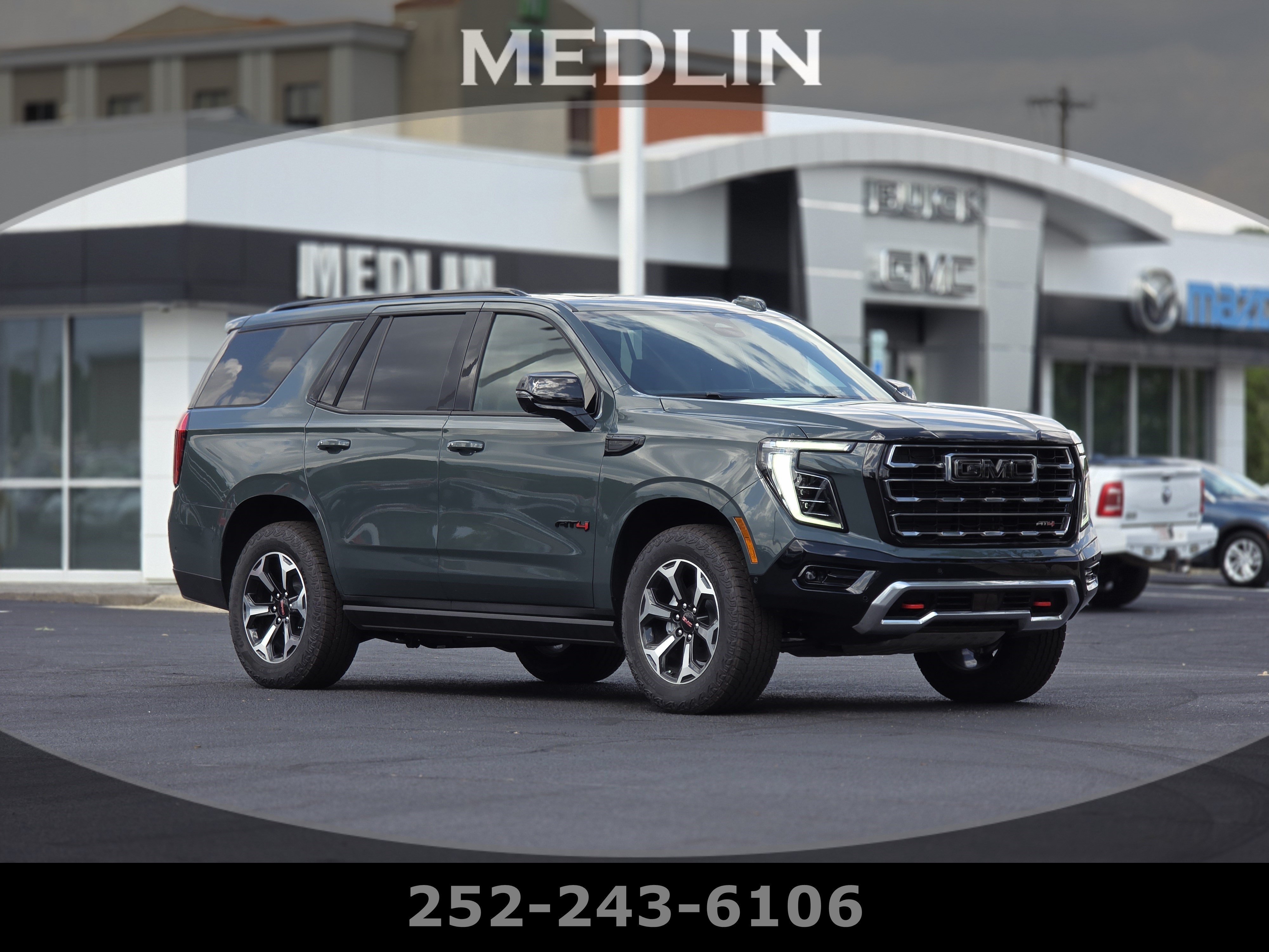 Used 2026 Midnight Pine GMC AT4 image 1