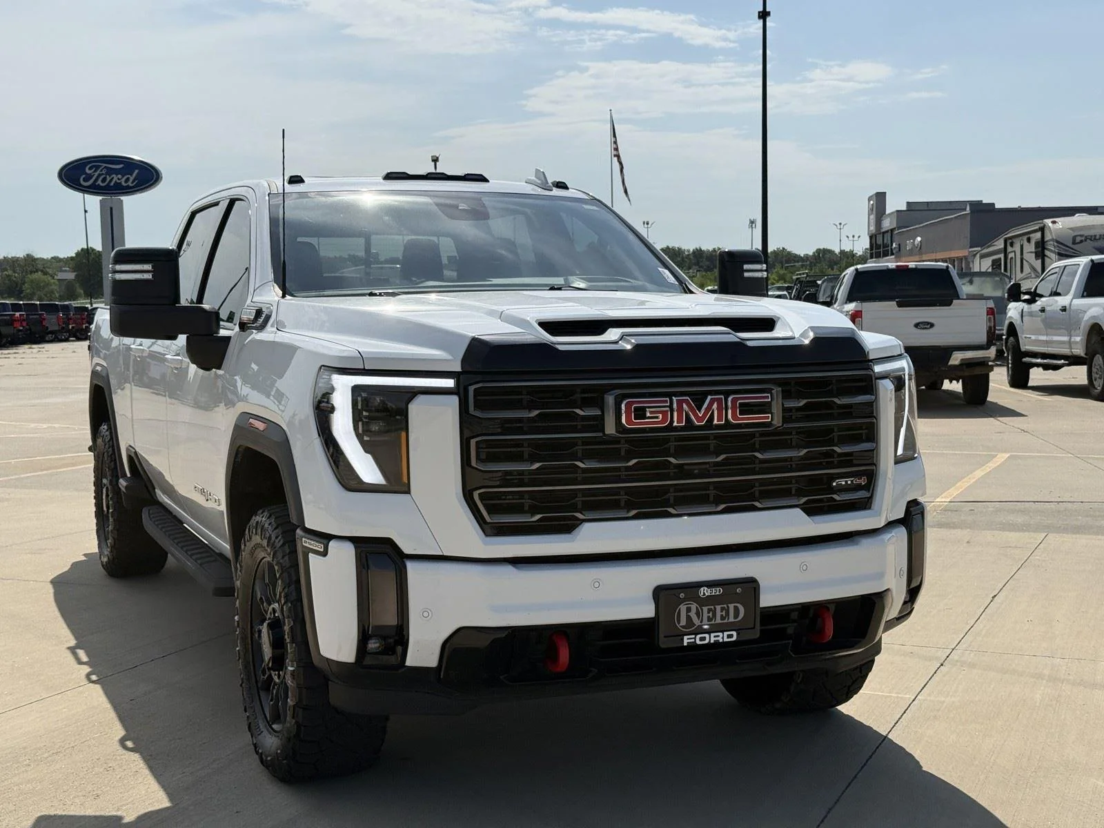 Used 2024 GMC Sierra 2500HD AT4 with VIN 1GT49PEY9RF316070 for sale in Kansas City