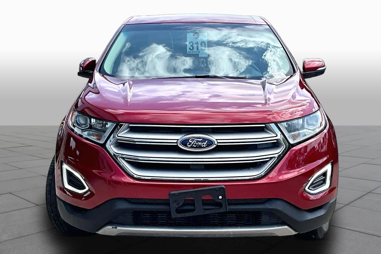 Used 2015 Ruby Red Metallic Tinted Clearcoat Ford SEL image 4