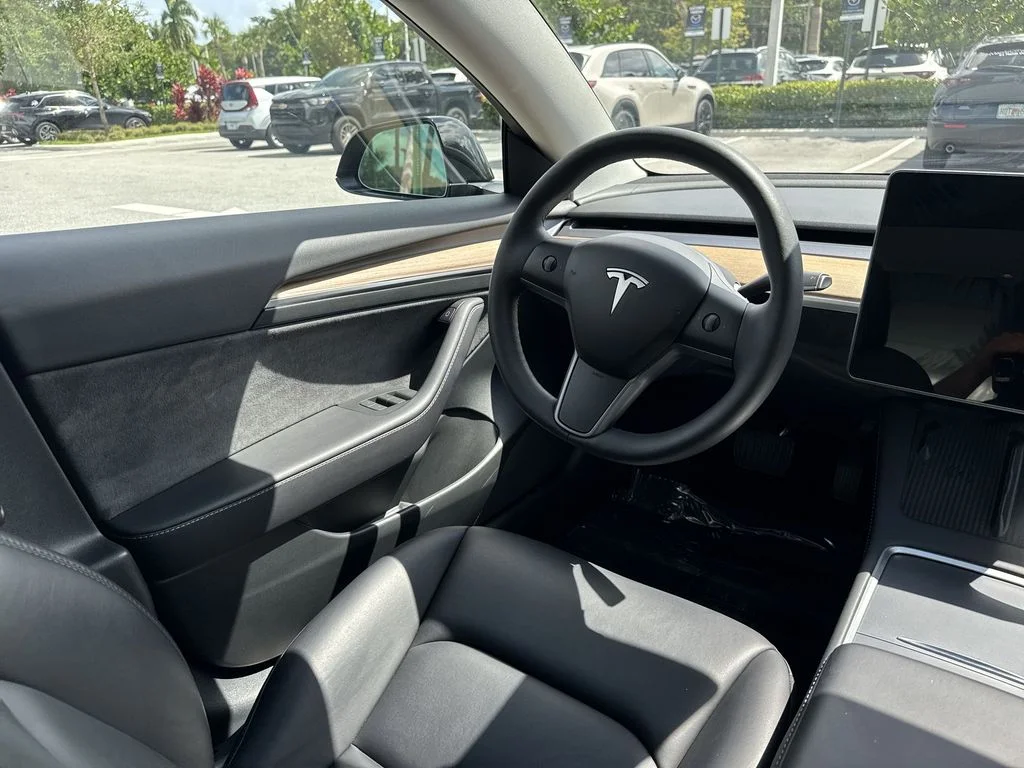 Used 2023 Solid Black Tesla  image 21