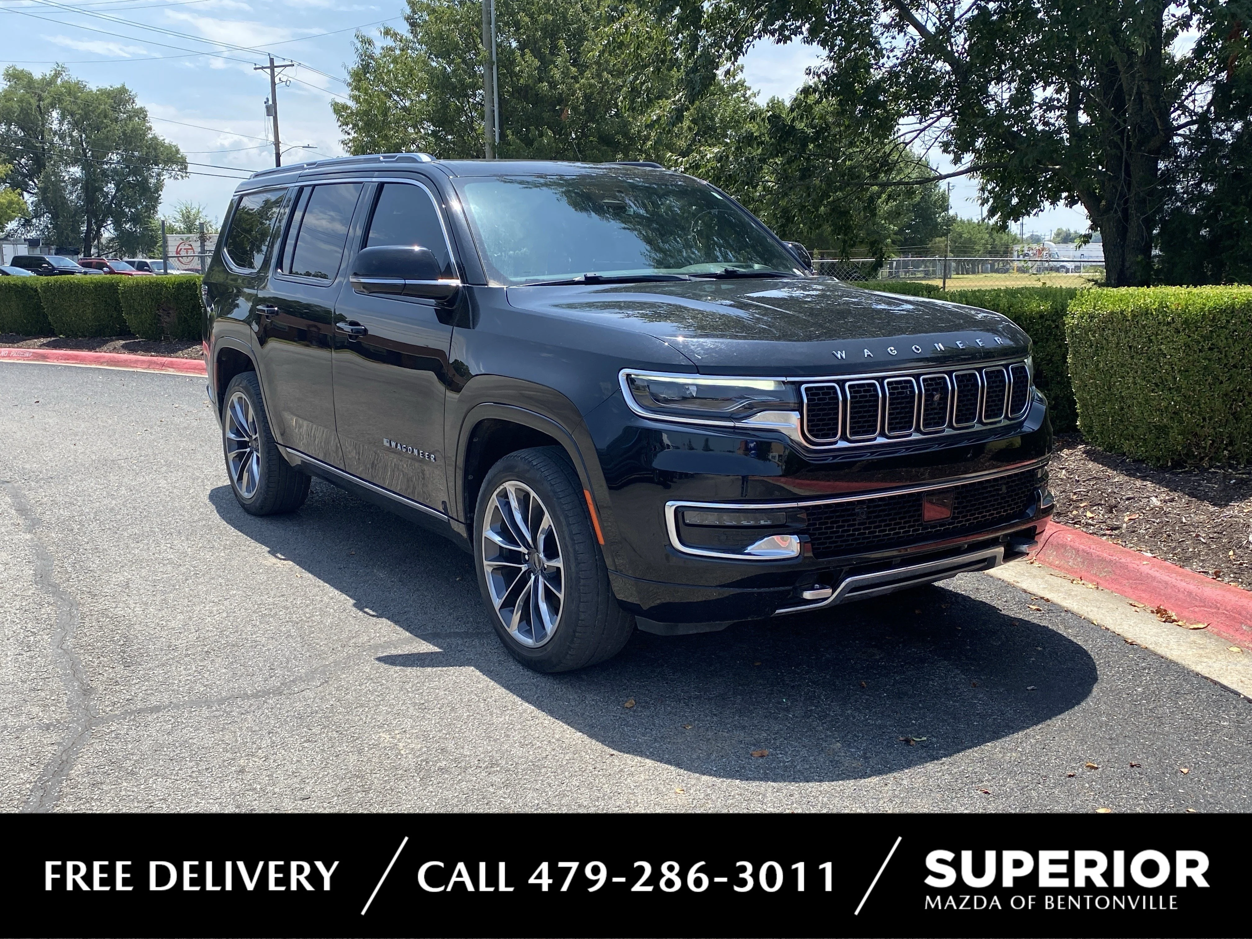 Used 2023 Diamond Black Crystal Pearlcoat Jeep Series III image 1