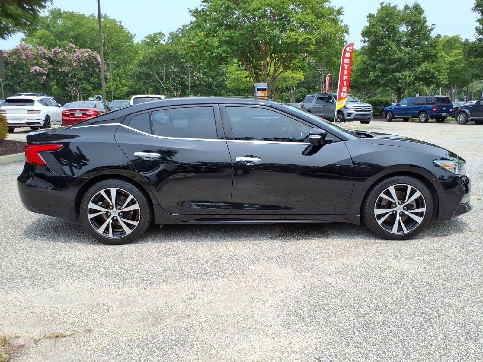 Used 2018 Super Black Nissan Platinum image 7