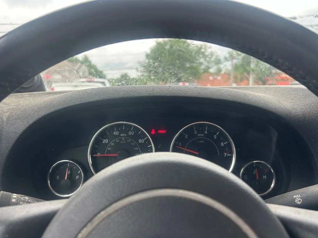 Used 2014 Gray Jeep Unlimited Sport image 17