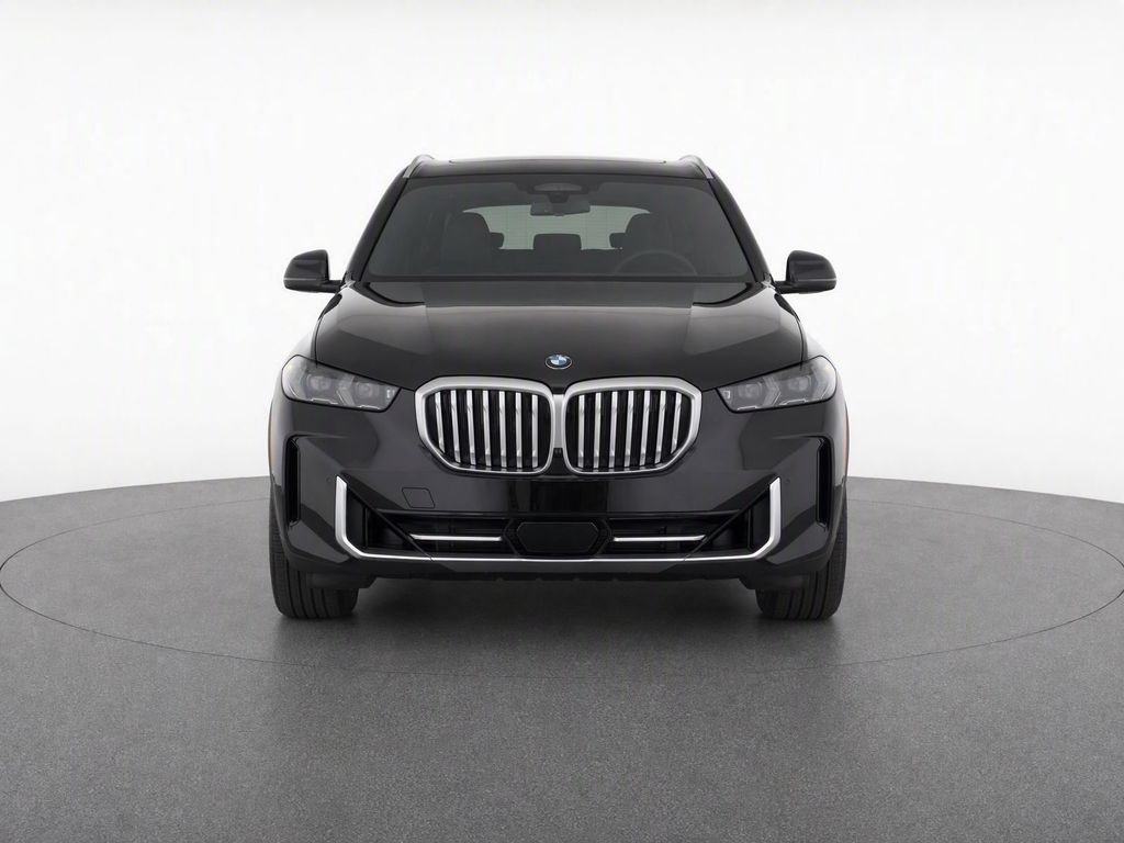 Certified Used 2025 Black Sapphire Metallic BMW xDrive40i image 2