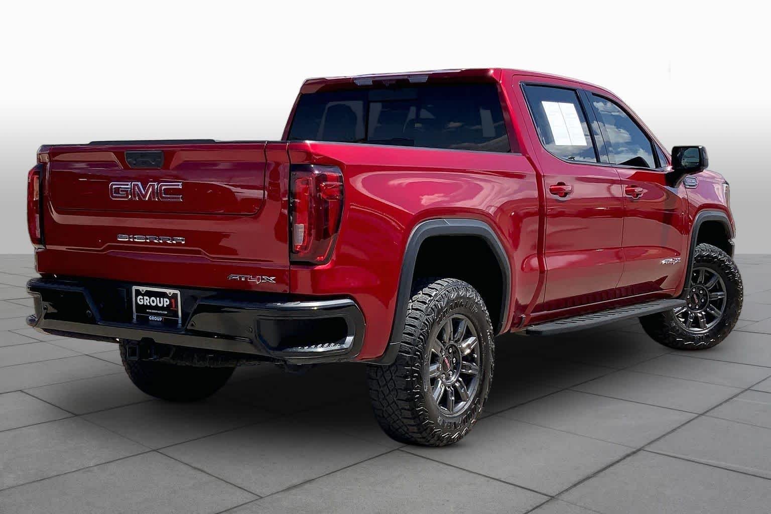 Used 2024 Volcanic Red Tintcoat GMC AT4X image 13