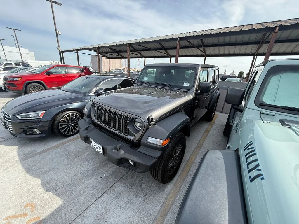 Used 2026 Gray Jeep Sport S image 1