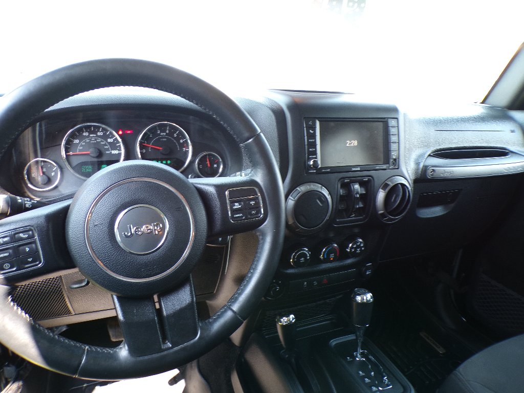 Used 2016 Black Clearcoat Jeep Sport image 15