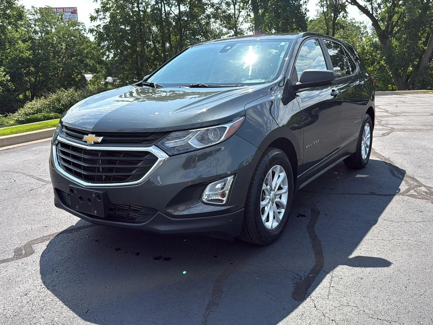 Used 2020 NIGHTFALL GRAY METALLIC Chevrolet LS image 1