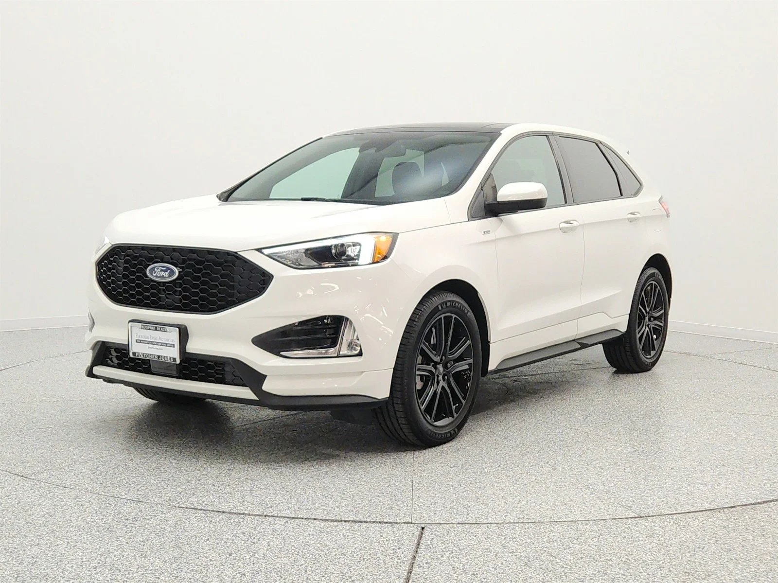 Used 2022 Star White Metallic Tri-Coat Ford ST-Line AWD image 1