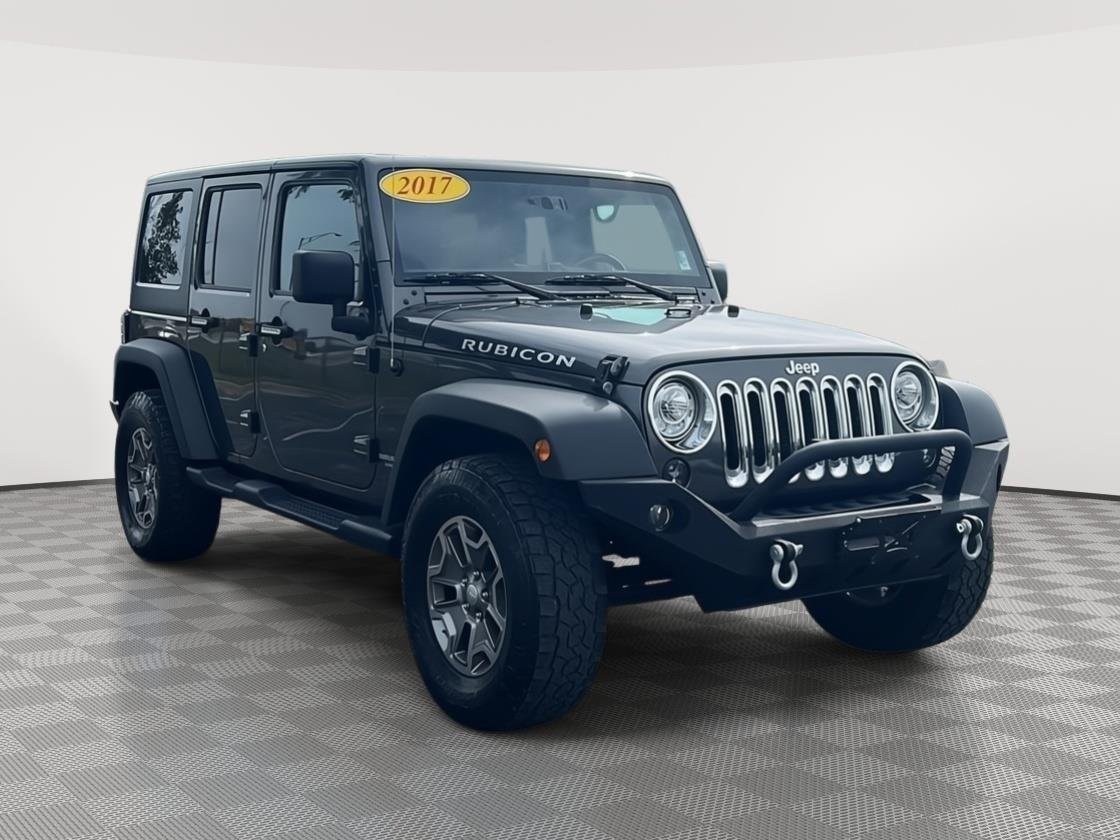 Used 2017 Granite Crystal Metallic Clearcoat Jeep Rubicon image 1