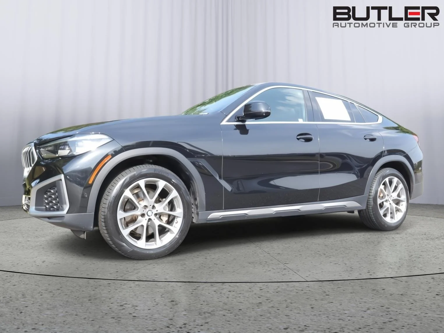 Used 2023 Black Sapphire Metallic BMW xDrive40i image 1