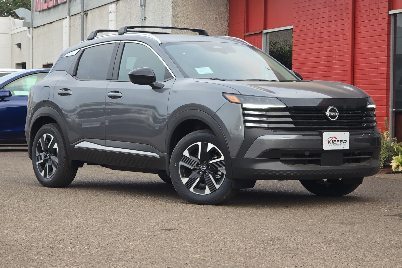 New 2026 Gun Metallic Nissan SV image 2