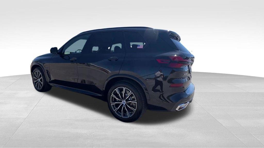 New 2026 Black Sapphire Metallic BMW xDrive50e image 10