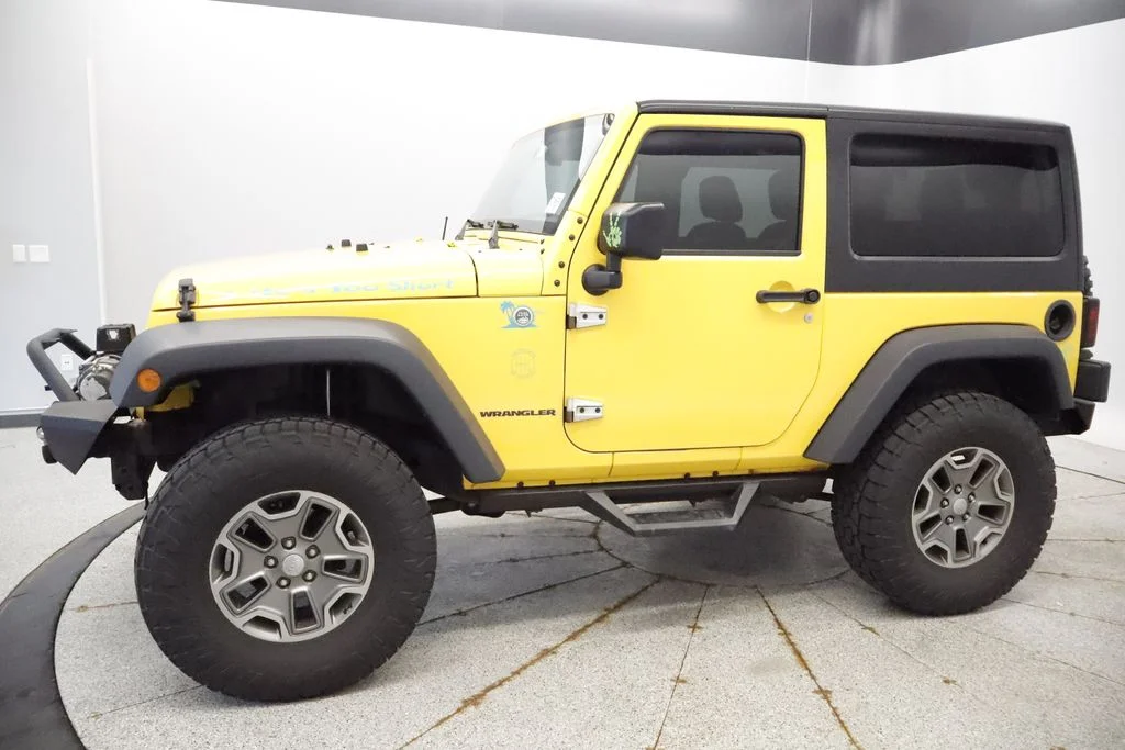 Used 2015 Yellow Jeep Rubicon image 4