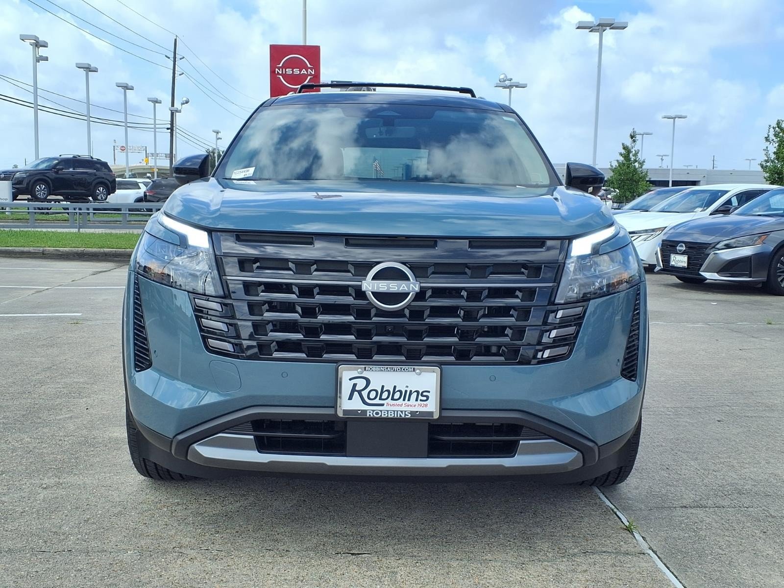 2026 Nissan Pathfinder Platinum Green at Robbins Nissan