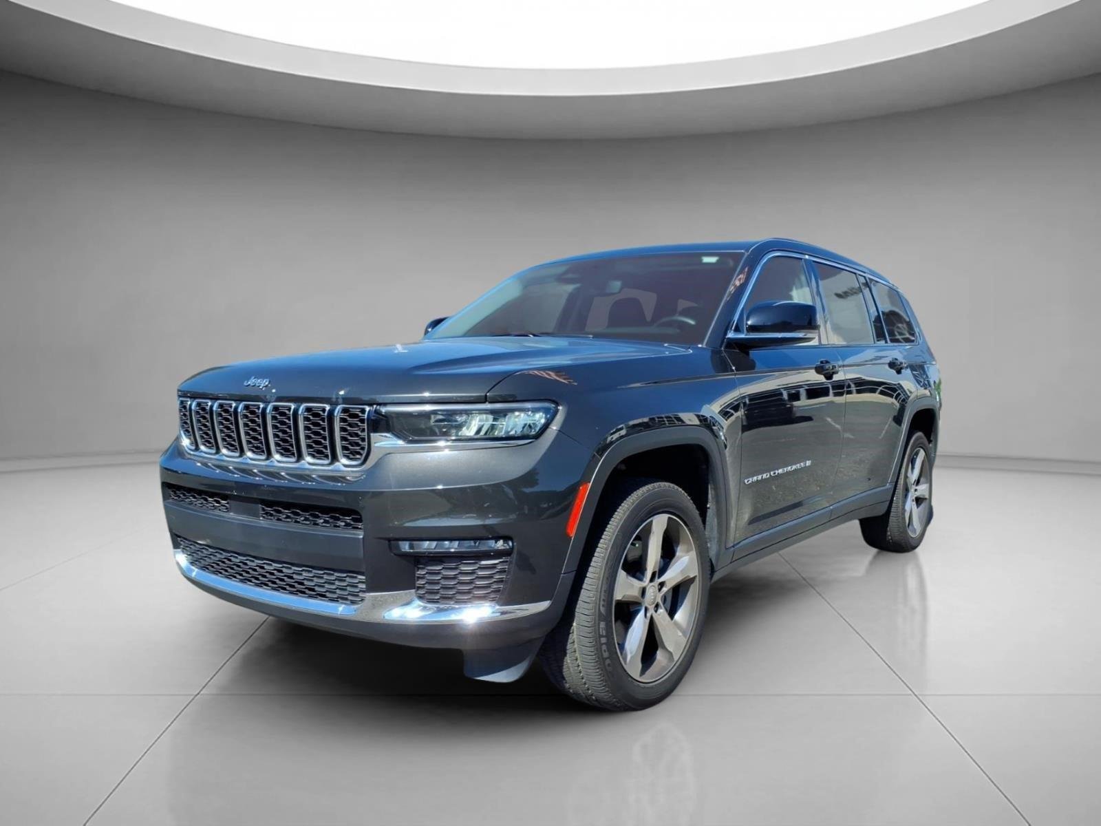 Used 2021 Rocky Mountain Pearlcoat Jeep Limited image 1