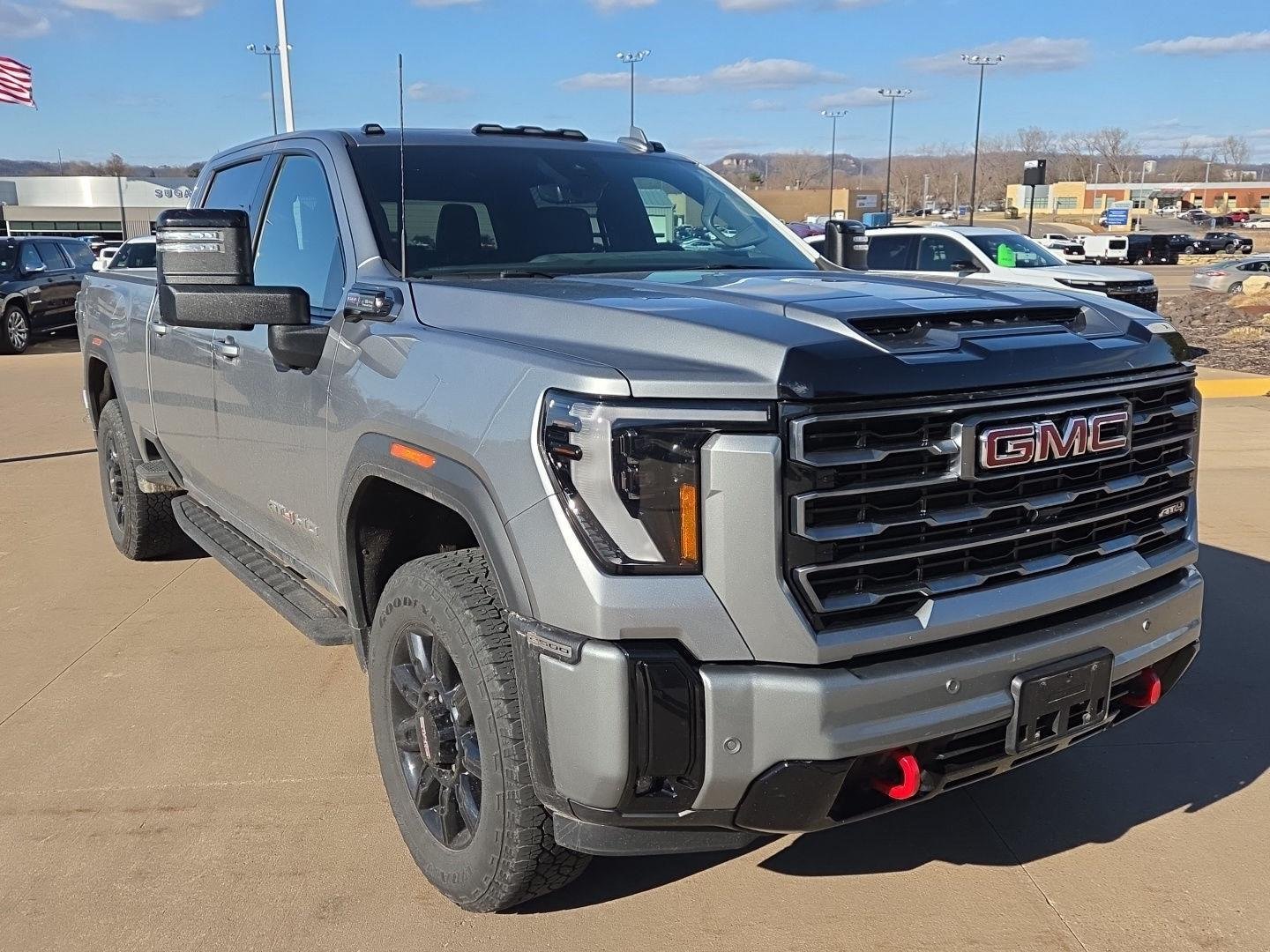 Used 2025 GMC Sierra 2500HD AT4 with VIN 1GT4UPE73SF129001 for sale in Winona, Minnesota