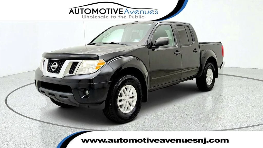 Used 2017 Magnetic Black Nissan 2017.5 Crew Cab 4x4 SV V6 Automatic w/ Value Truck Pkg image 1