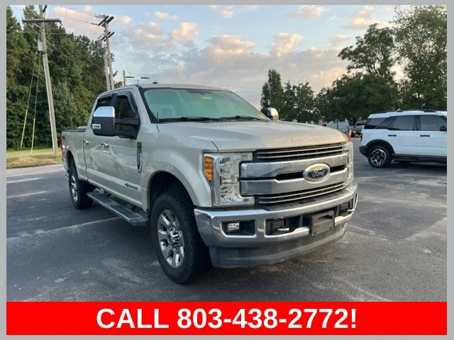 Used 2017 Gold Ford Lariat image 1
