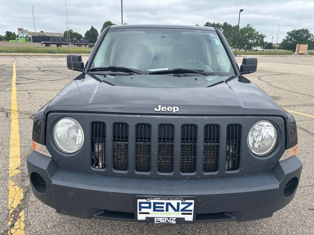 Used 2010 Black Jeep Sport image 2