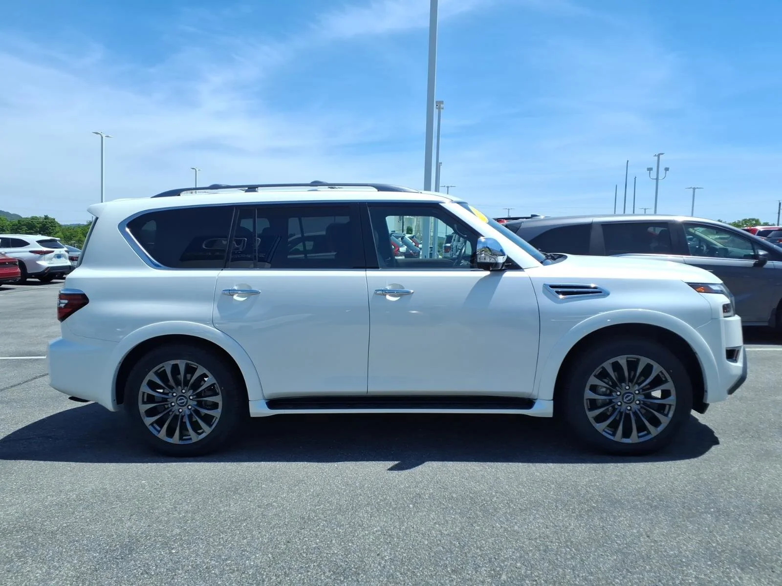 Used 2023 Aspen White Tricoat Nissan Platinum image 4