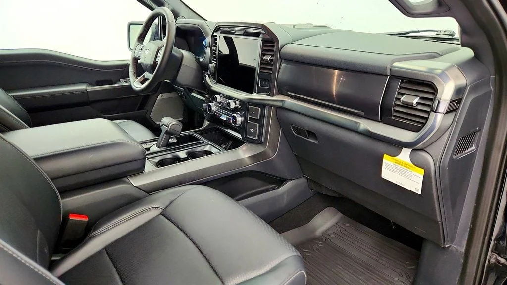 Used 2025 Agate Black Metallic Ford LARIAT 4WD SuperCrew 5.5