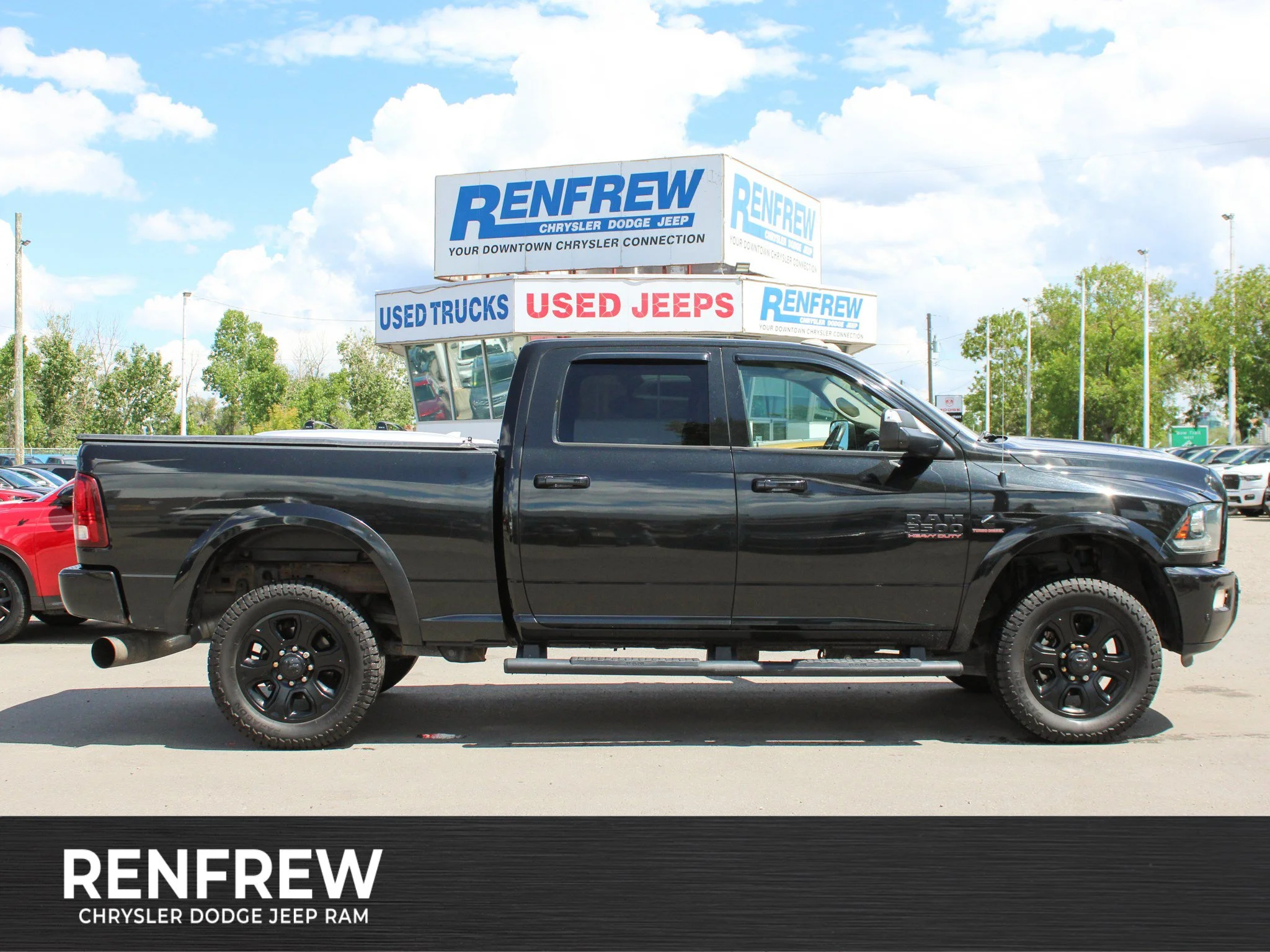 Used 2017 Black RAM Laramie* 6 Speed Manual | Heated/Vented Leather Seats | Nav | Bedliner | Diesel | Alpine image 1